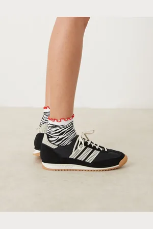 ASOS – Knöchelsocken mit farblich abgesetzter Rüschenkante und Zebramuster