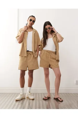 Reclaimed – Unisex-Shorts aus Cord in Braun