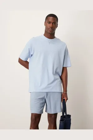 MANGO – Locker geschnittenes T-Shirt aus Leinenmix in Blassblau