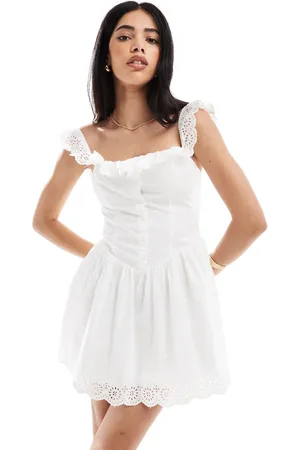 Bershka – Voluminöses Minikleid in mit lasergeschnittenen Rüschen
