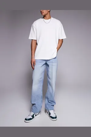 ASOS – Weite Jeans in verwaschenem Hellblau