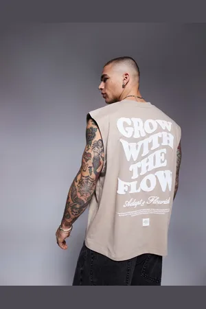ASOS – Kastiges Oversize-Tanktop in Beige mit Text-Grafikprint