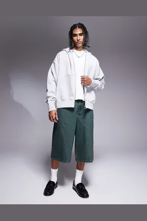 ASOS – Länger geschnittene Jeans-Jorts in dunkelblauer Waschung mit Farbstich