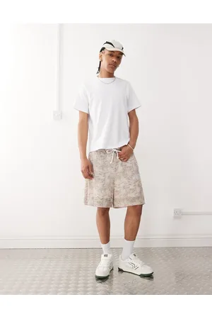 ASOS – Oversize-Shorts in Beige mit Blattmuster
