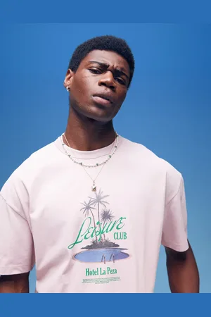 ASOS – Kastiges Oversize-T-Shirt aus 220 g/m² schwerem Stoff in verwaschenem mit Palmen-Brustprint
