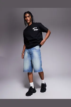 ASOS – Länger geschnittene Carpenter-Jorts aus Denim in verwaschenem Mittelblau