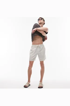 Rhythm – Jam-Shorts aus Seersucker in Creme