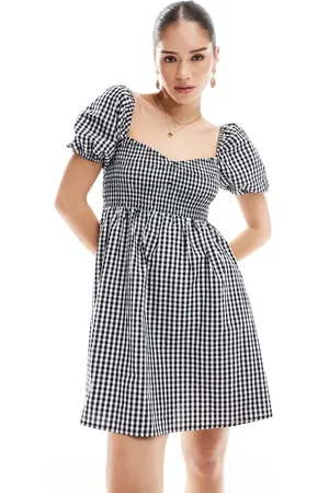 Esmée – Exklusiv – Kurzes Strandkleid mit Puffärmeln und schwarz-weißen Vichy-Karos