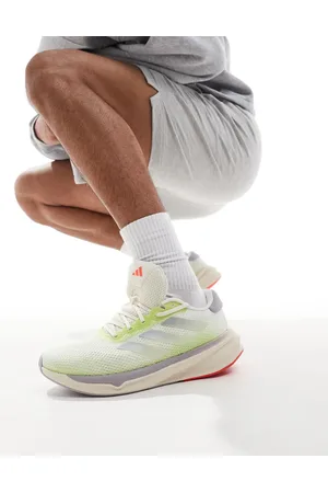 adidas Adidas Running – Supernova Stride – Sneaker in Wollweiß und Limettengrün