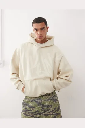 Karl Kani – Kapuzenpullover in Beige mit Signatur-Tag-Grafiklogo