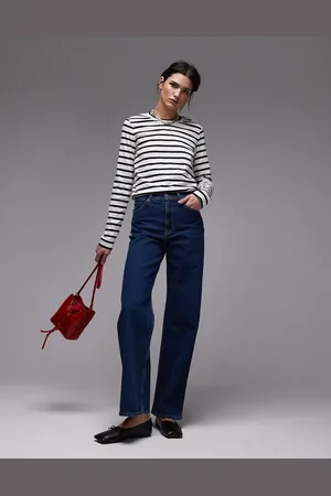 ARKET – Lupine – Weit geschnittene Jeans in mittelblauer Waschung mit hohem Bund