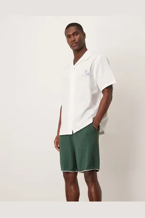 ASOS – Oversize-Strickshorts in Dunkelgrün mit Languettennaht