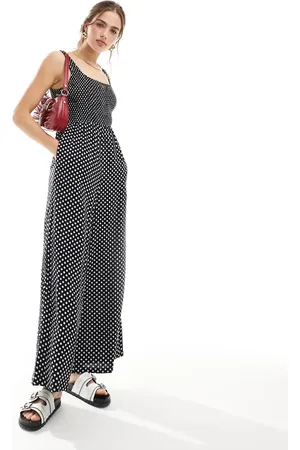 ASOS – Jumpsuit in Schwarz-Weiß gepunktet mit U-Boot-Ausschnitt und weitem Bein