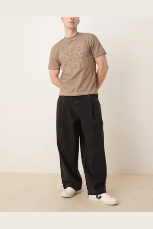 ASOS – Weite Oversize-Jeans in verwaschenem mit Falten an den Taschen