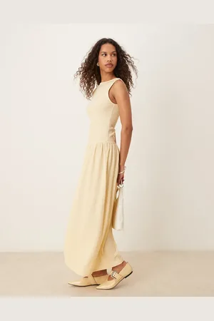 ASOS – Strukturiertes Maxikleid in Buttermilchgelb mit tiefer Taille