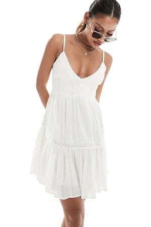 River Island – Gestuftes Minikleid in