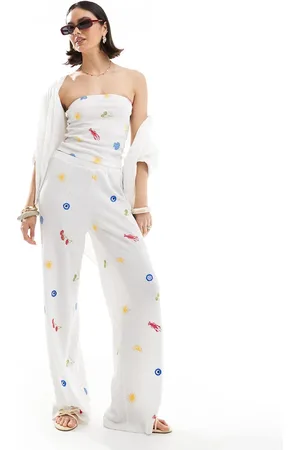 ASOS – Hose in mit geradem Bein und Urlaubsmotiv-Stickereien
