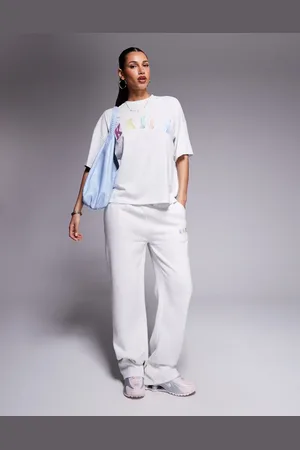Kaiia – Jogginghose in meliert mit weitem Bein und aufgesticktem Regenbogen-Logo, Kombiteil