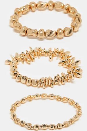 Accessorize – Coral Reef – 3er-Pack elastische Armreife in Gold