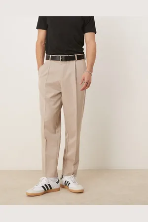 ASOS – Elegante Relaxed Fit Hose in Steinbeige mit schmal zulaufendem Bein und Bügelfalte vorne