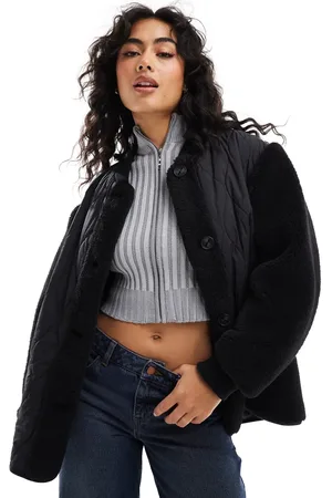 ASOS – Pufferjacke in Schwarz mit gespleißtem Teddyfell-Design