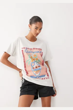 Reclaimed – Oversize-T-Shirt mit Vasen-Kunstdruck in sanftem Buttermilchbeige