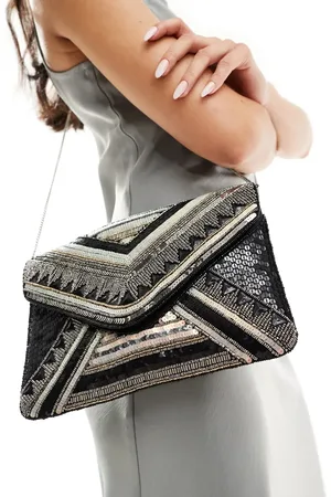 True Decadence – Umschlag-Clutch in und Gold mit Perlenbesatz