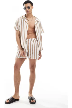 HUGO BOSS Boss – Gestreifte Badeshorts in Beige und , Kombiteil