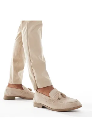 River Island – Loafer aus Wildlederimitat in Steinbeige mit Quastendetail