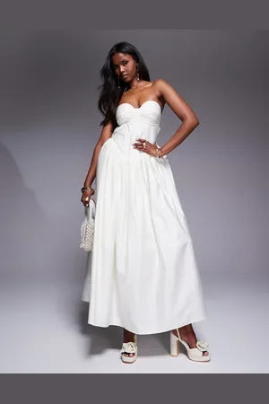 ASOS – Korsett-Maxikleid aus Baumwoll-Satin in Buttermilchgelb mit Zierschleife am Rücken