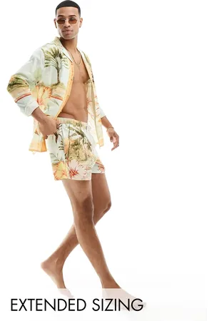 ASOS – Kurze Badeshorts mit tropischem Muster, Kombiteil