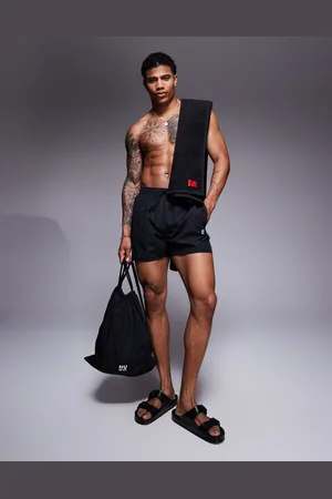 HUGO BOSS – Cruise – Set mit Badetuch und Badeshorts in mit Logo