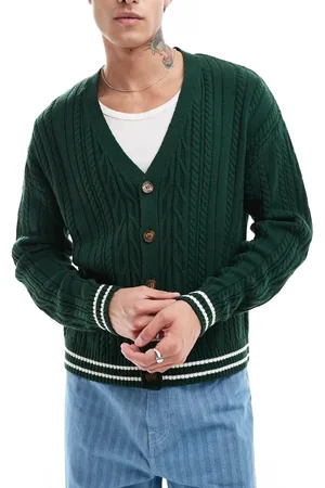 ASOS – Kastig und lässig geschnittene Strickjacke in Dunkelgrün mit Zopfmuster und Zierstreifen in Creme