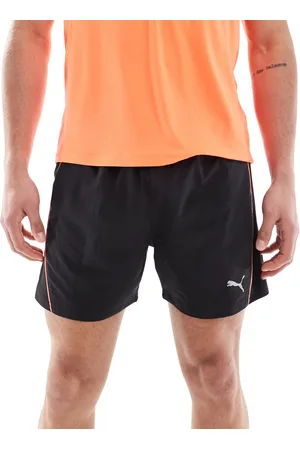 PUMA – Run Velocity – Shorts in mit roter Paspelierung