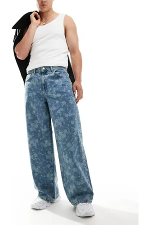 ASOS – Super weite Jeans mit floralem Design in verwaschenem
