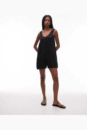 ARKET – Strand-Playsuit aus reinem Leinen in mit tiefem V-Ausschnitt und Taschendetail