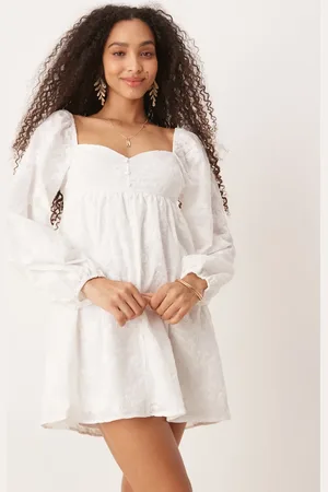 Gina Tricot – Langärmliges Minikleid in mit Blumenmuster unten und Knopfleiste