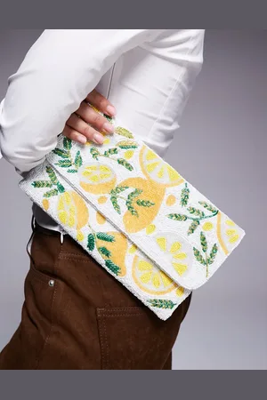 True Decadence – Perlen-Clutch in Weiß mit Zitronenmotiven in Gelb