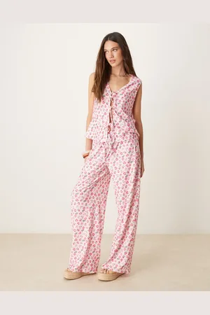 ASOS – Hose in geblümt mit weitem Bein und Bindeband vorne