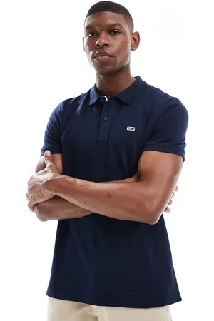 Tommy Hilfiger – Polohemd in mit schmalem Schnitt und Knopfleiste