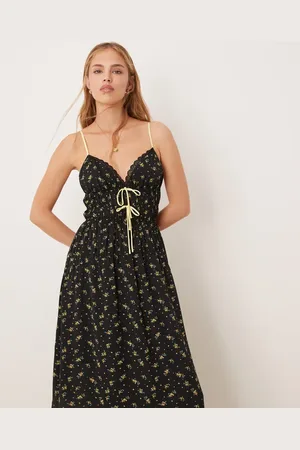 Kiss The Sky – Ärmelloses Maxikleid in mit Blumenmuster und V-Ausschnitt