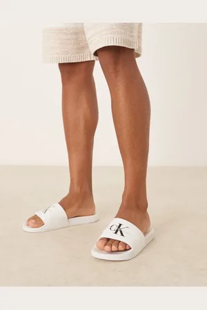 Calvin Klein – Slider in und Schwarz mit Monogramm