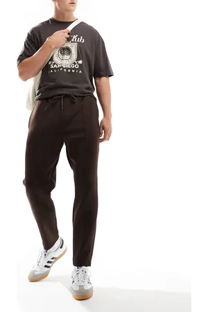 ASOS – Schmal zulaufende Jogginghose in brauner Neopren-Optik