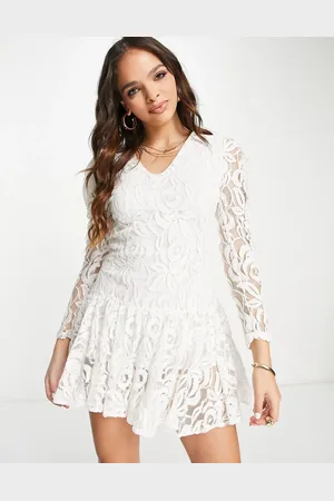 John Zack – Minikleid aus weißer Spitze mit asymmetrischem Saum