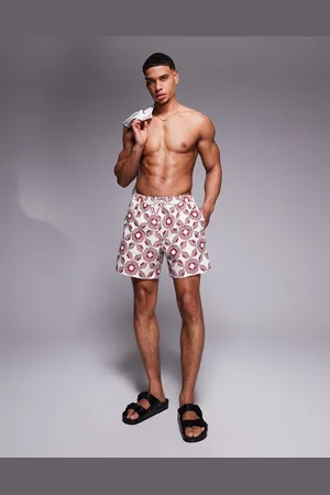 ASOS – Mittellange Badeshorts in Steinbeige mit geometrischem Print