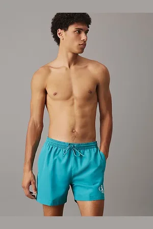 Calvin Klein Medium Badeshorts mit Tunnelzug – CK Monogram