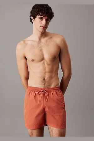 Calvin Klein Medium Badeshorts mit Tunnelzug – CK Monogram