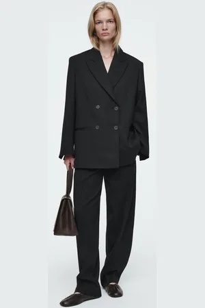 COS Die Elegante Hose Mit Barrel-Bein