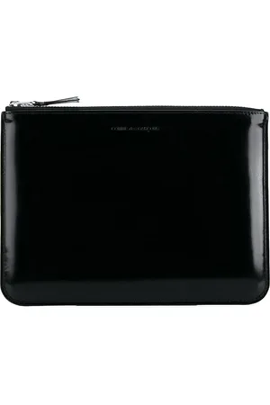 Comme des Garçons Clutch mit Logo-Prägung