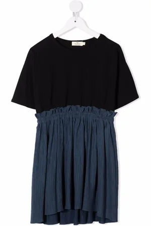 Le pandorine Kleid mit Plisseerock